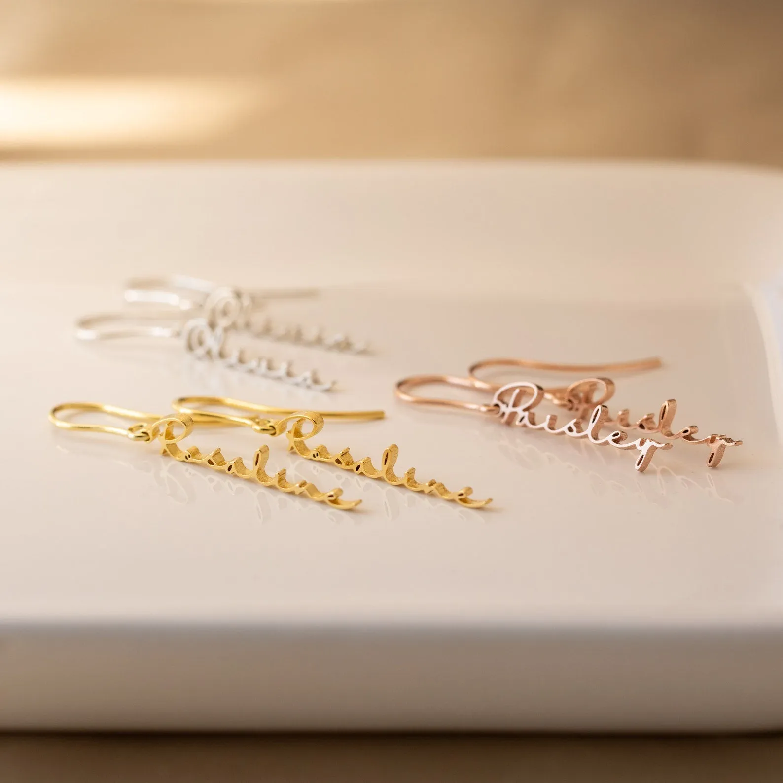 Hallie Dangling Name Earrings